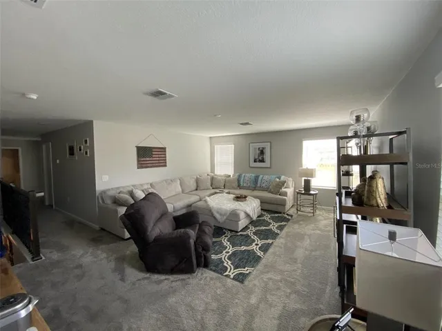 a view of storage and utility room with washer and dryer