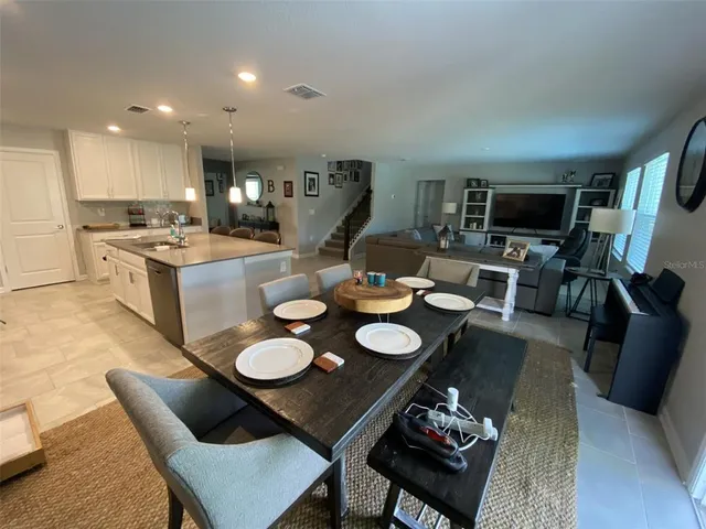 a living room with furniture window and a window