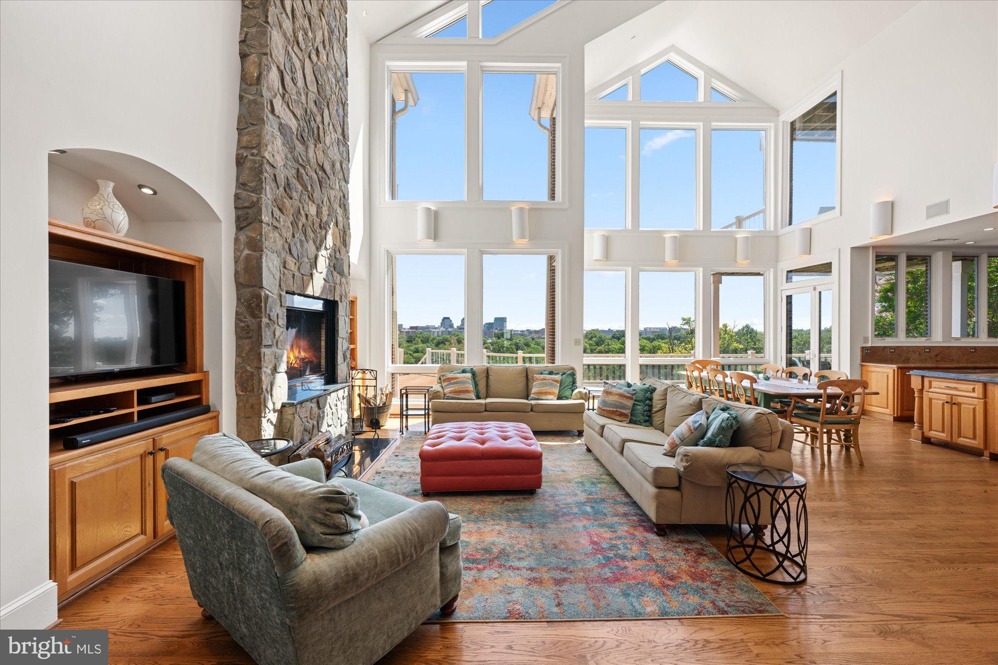 1701 South Arlington Ridge Road Arlington, VA 22202 - Photo 12 of 90 a living room with furniture and a flat screen tv
