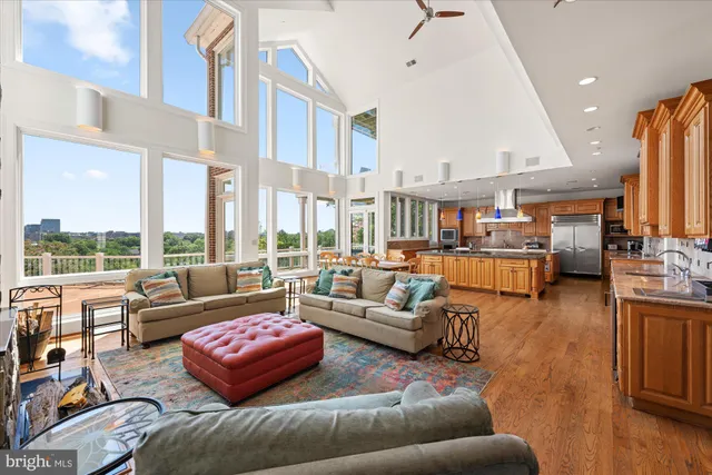 a kitchen with stainless steel appliances granite countertop a stove and a refrigerator