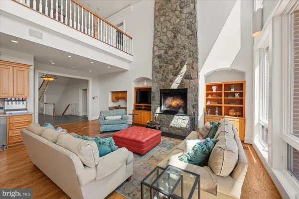 a kitchen with stainless steel appliances granite countertop a stove and a sink