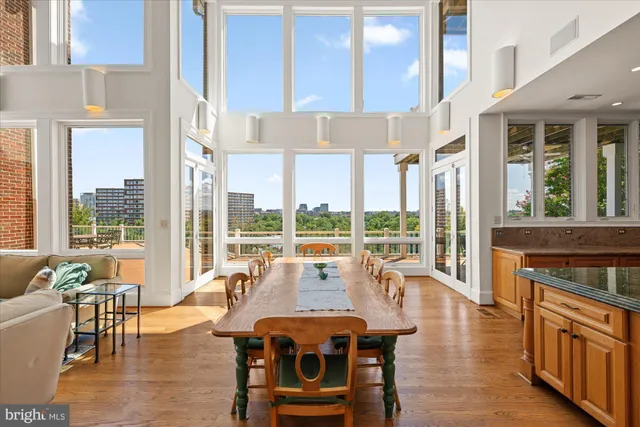 a view of a dining room with furniture window and wooden floor