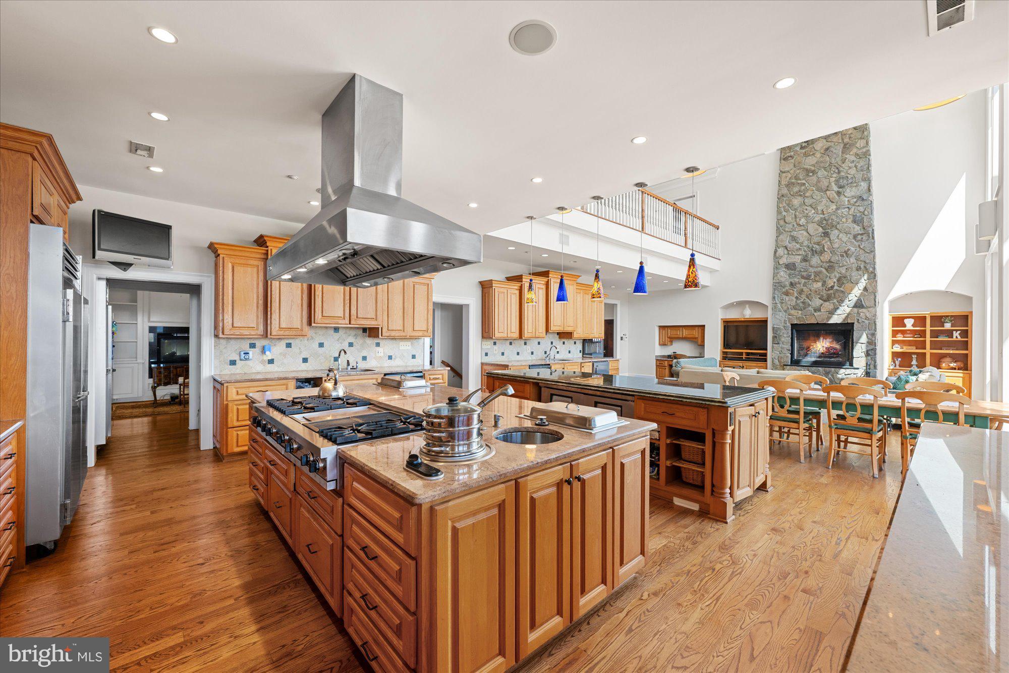 1701 South Arlington Ridge Road Arlington, VA 22202 - Photo 29 of 90 a kitchen with stainless steel appliances granite countertop a stove and a refrigerator