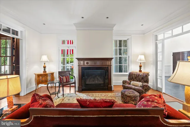 a view of a livingroom with furniture hardwood floor and a flat screen tv