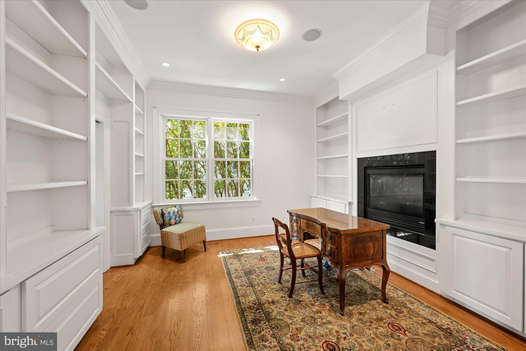 1701 South Arlington Ridge Road Arlington, VA 22202 - Photo 37 of 90 a view of a dining room with furniture window and wooden floor