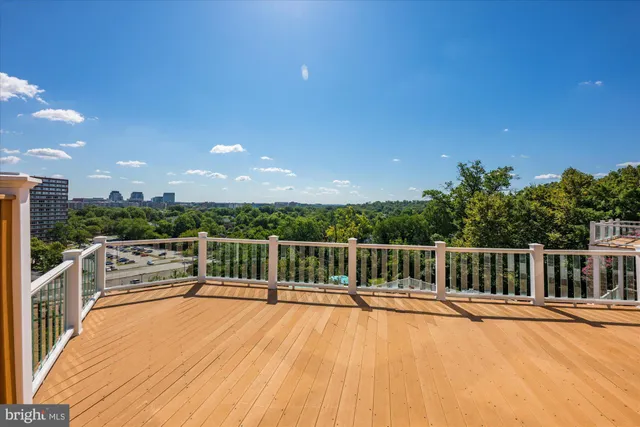 a spacious bedroom with a bed and a window