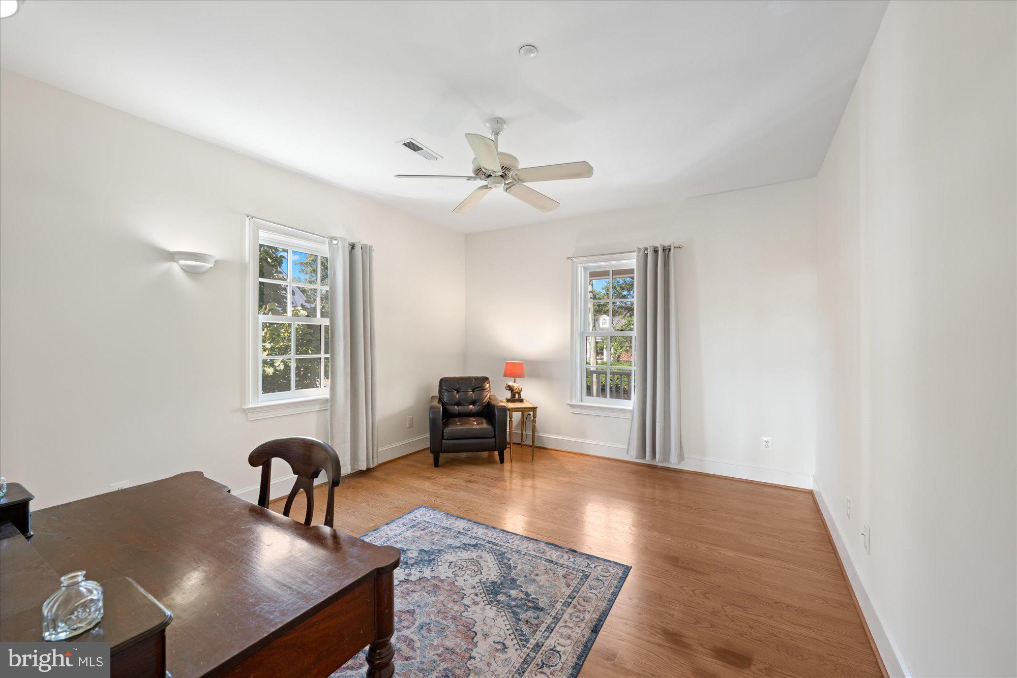 1701 South Arlington Ridge Road Arlington, VA 22202 - Photo 57 of 90 a living room with furniture and window