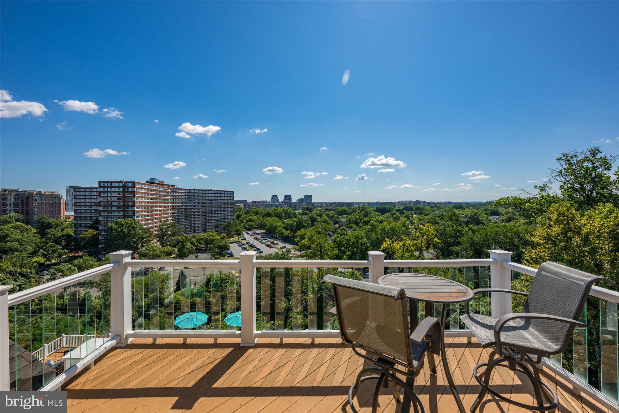 1701 South Arlington Ridge Road Arlington, VA 22202 - Photo 69 of 90 a view of a chairs and table in the balcony
