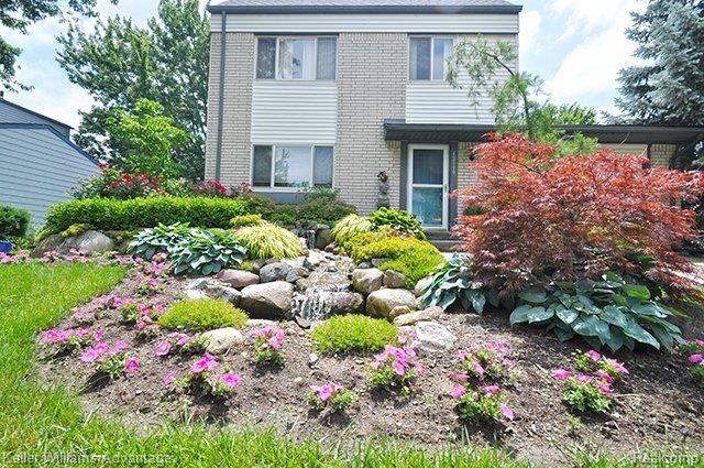42119 Loganberry Ridge North Novi, MI 48375 - Photo 20 of 25 20_FrontYard_1-1.jpg