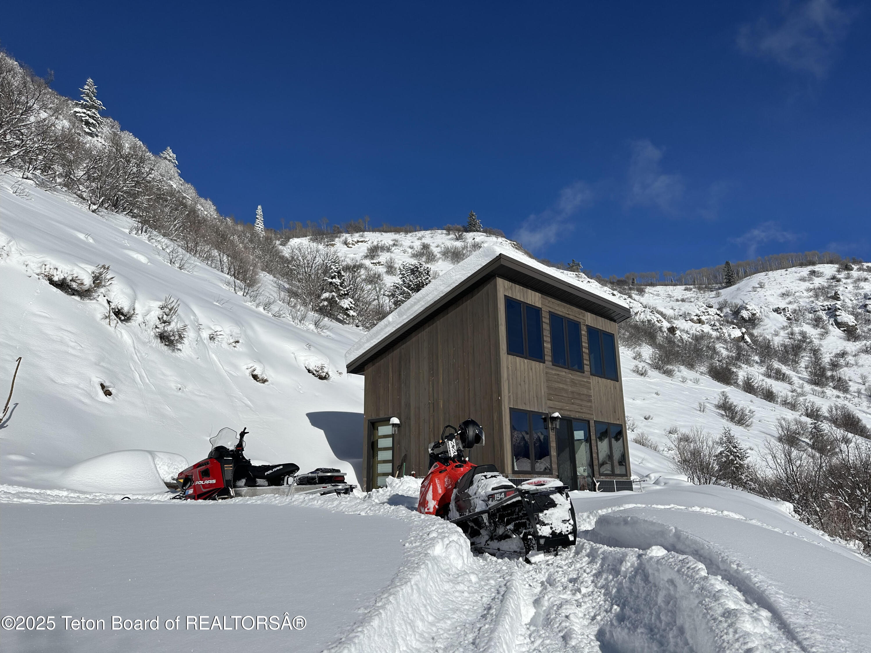 170 Maple Heights Road Irwin, ID 83428 - Photo 5 of 18 Snowmobiling