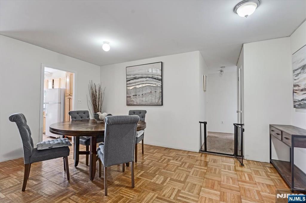 90 Prospect Avenue, Unit 7A Hackensack, NJ 07601 - Photo 4 of 21 a view of a dining room with furniture