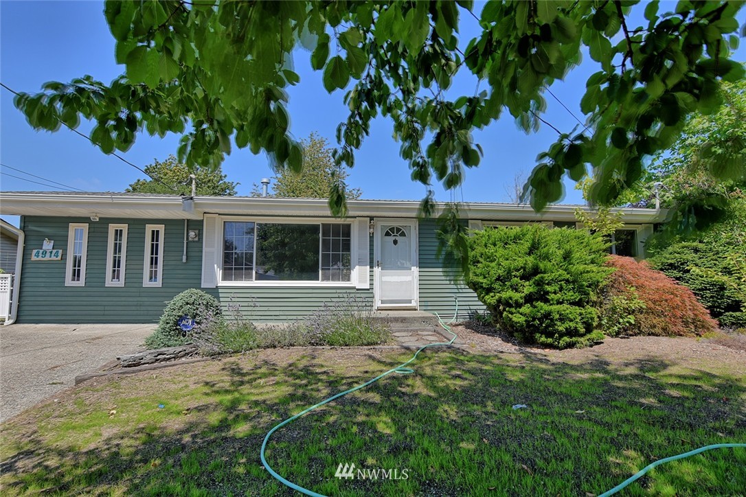 4914 Northeast 7th Place Renton, WA 98059 - Photo 1 of 19