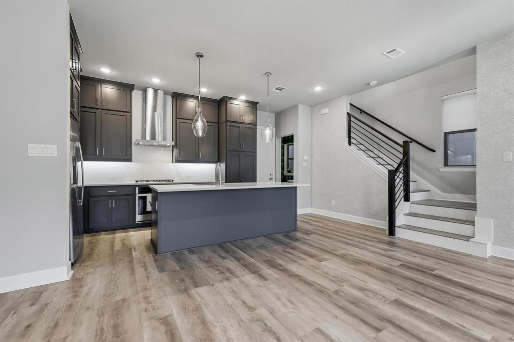 7129 Laurel Ridge Dallas, TX 75231 - Photo 6 of 35 Open concept Kitchen, Dining and Living Room