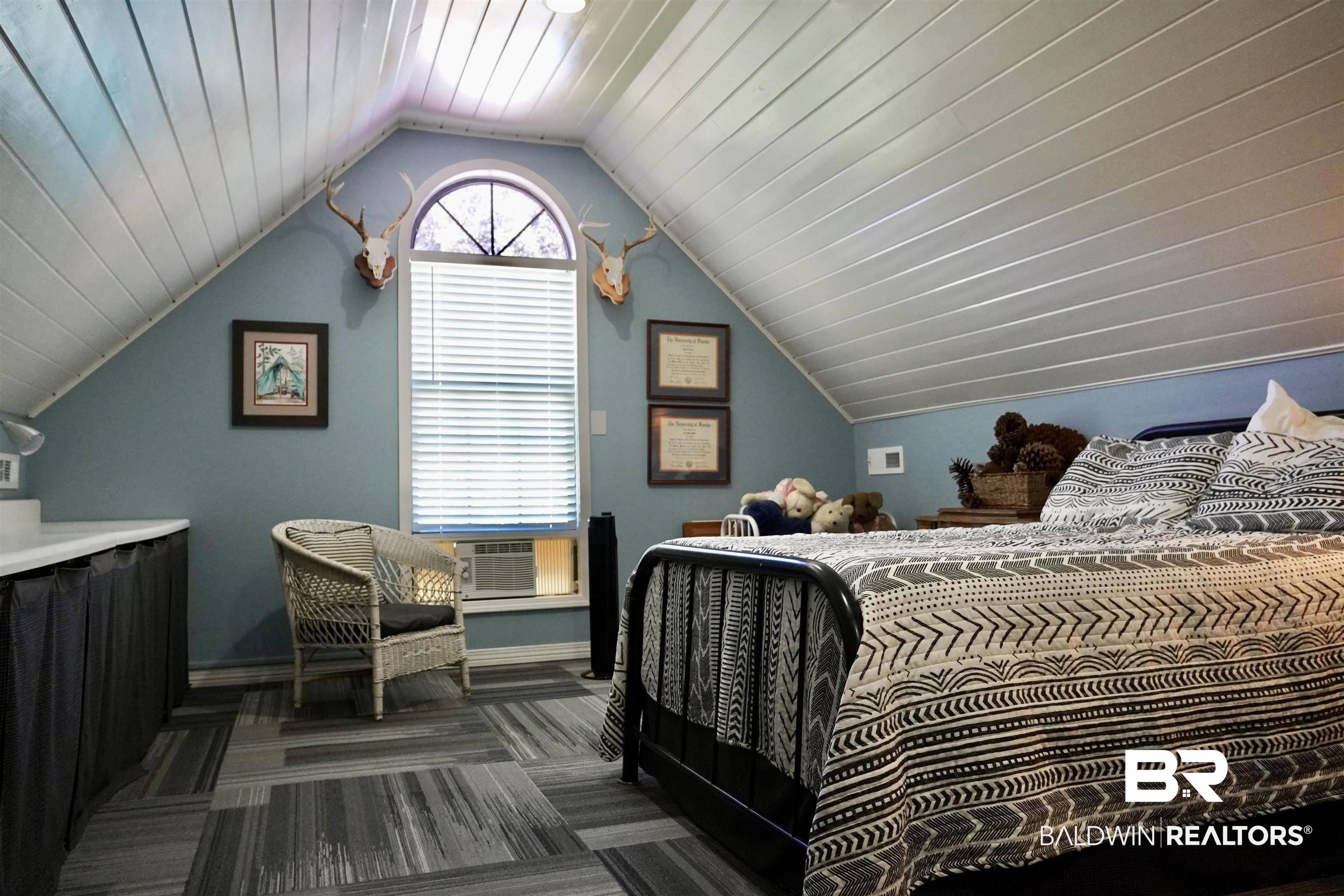 117 Belle Meade Brewton, AL 36426 - Photo 28 of 62 Bedroom with cooling unit, vaulted ceiling, dark carpet, and wooden ceiling