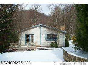 653 Spring Valley Street Mars Hill, NC 28754 - Photo 2 of 9 a view of a house with a yard