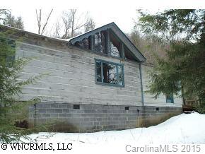 653 Spring Valley Street Mars Hill, NC 28754 - Photo 4 of 9 a front view of a house with a yard
