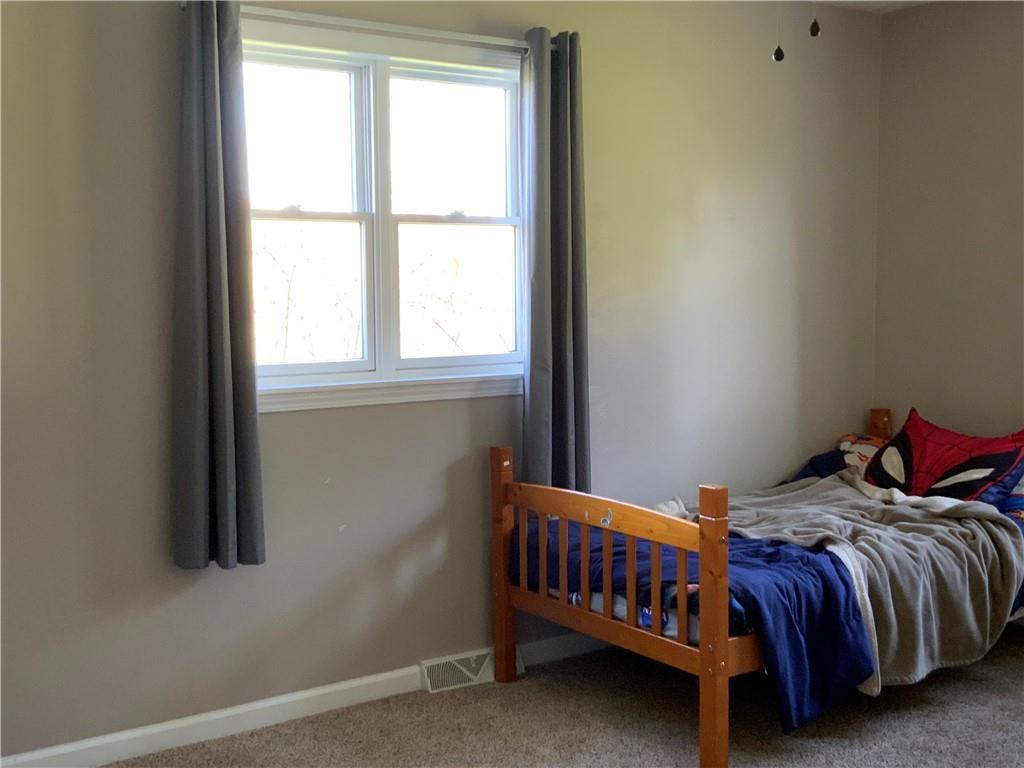 102 Memorial Road West Alexander, PA 15376 - Photo 11 of 19 a bedroom with a bed and window