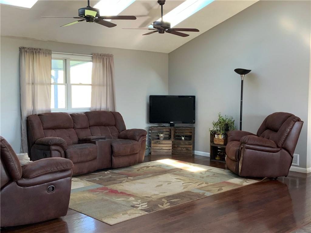 102 Memorial Road West Alexander, PA 15376 - Photo 3 of 19 a living room with furniture and a flat screen tv