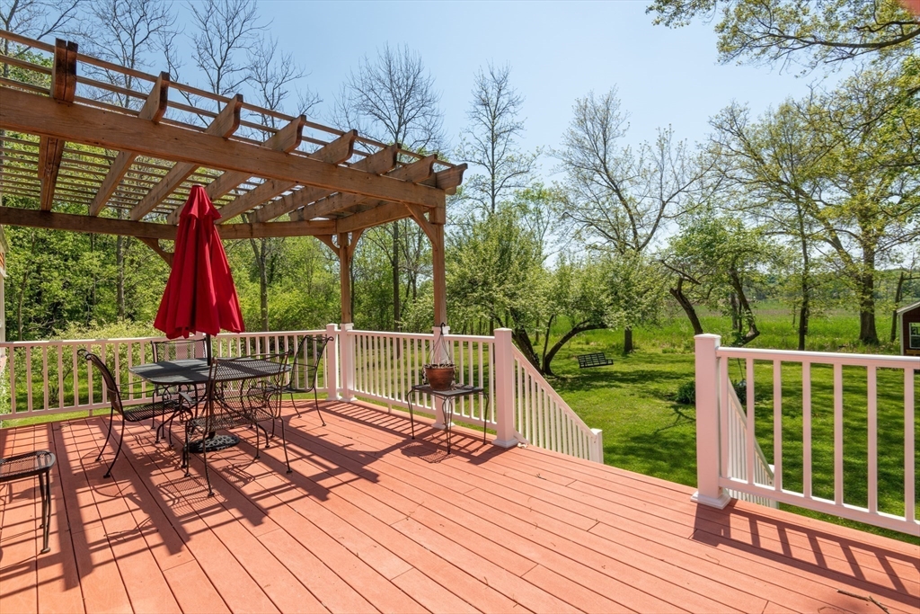 47 Argilla Road Ipswich, MA 01938 - Photo 11 of 42 a view of balcony with wooden floor and outdoor seating