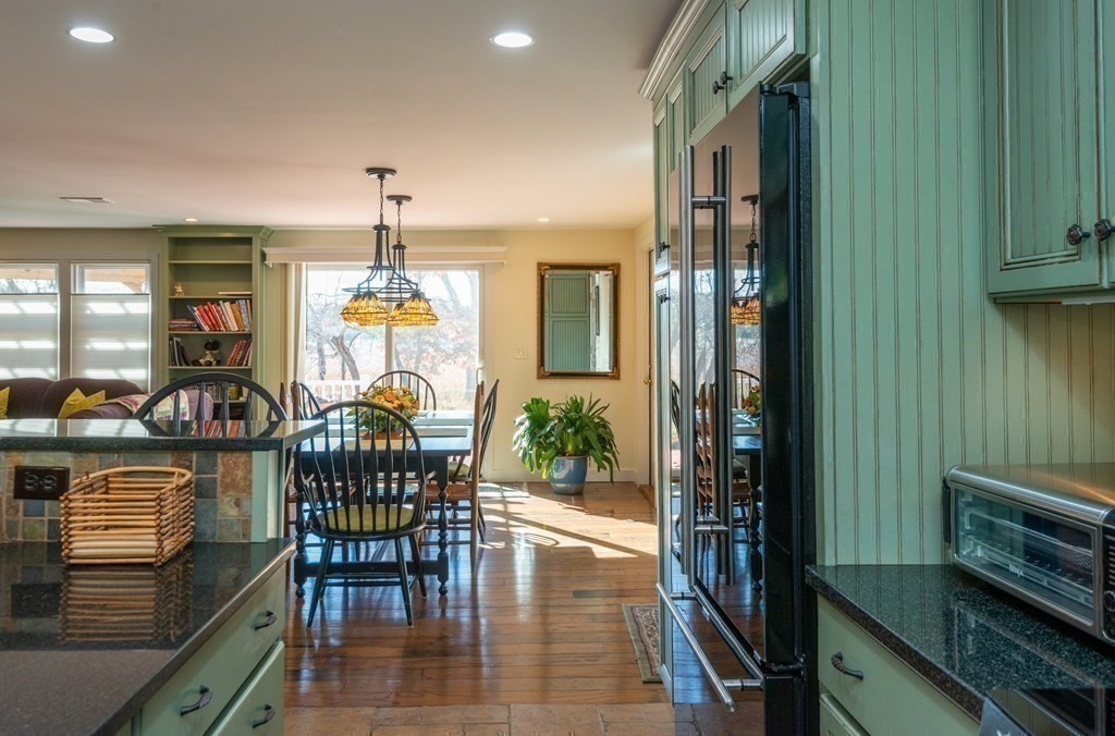 47 Argilla Road Ipswich, MA 01938 - Photo 16 of 42 a view of a dining room with furniture window and wooden floor