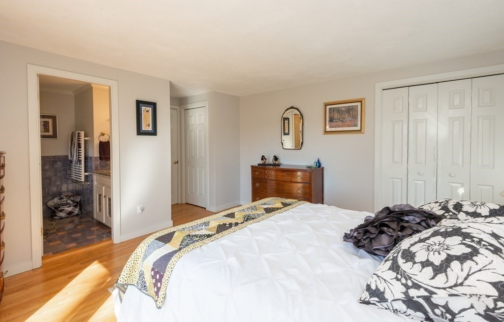 47 Argilla Road Ipswich, MA 01938 - Photo 31 of 42 a bedroom with a bed and a window