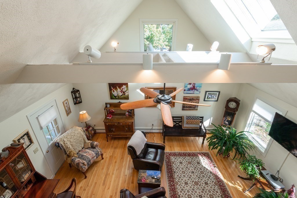 47 Argilla Road Ipswich, MA 01938 - Photo 33 of 42 a living room with furniture and a fireplace
