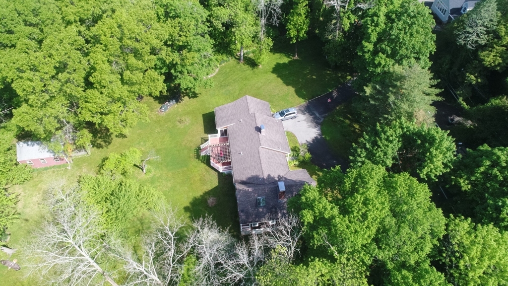47 Argilla Road Ipswich, MA 01938 - Photo 41 of 42 an aerial view of a house with a yard and garden
