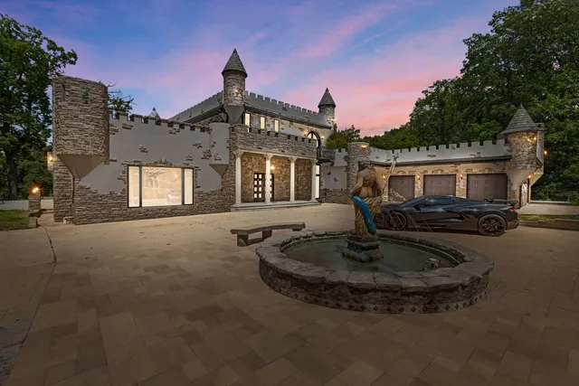 a front view of a house with entertaining space