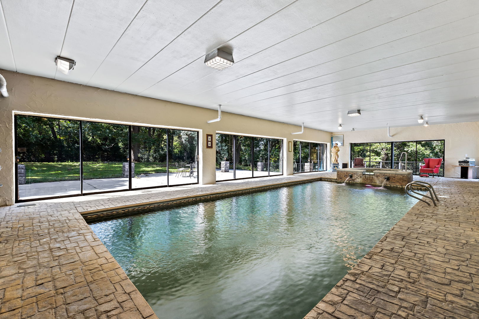 3 Saville Row Barrington Hills, IL 60010 - Photo 23 of 53 a view of swimming pool with outdoor seating