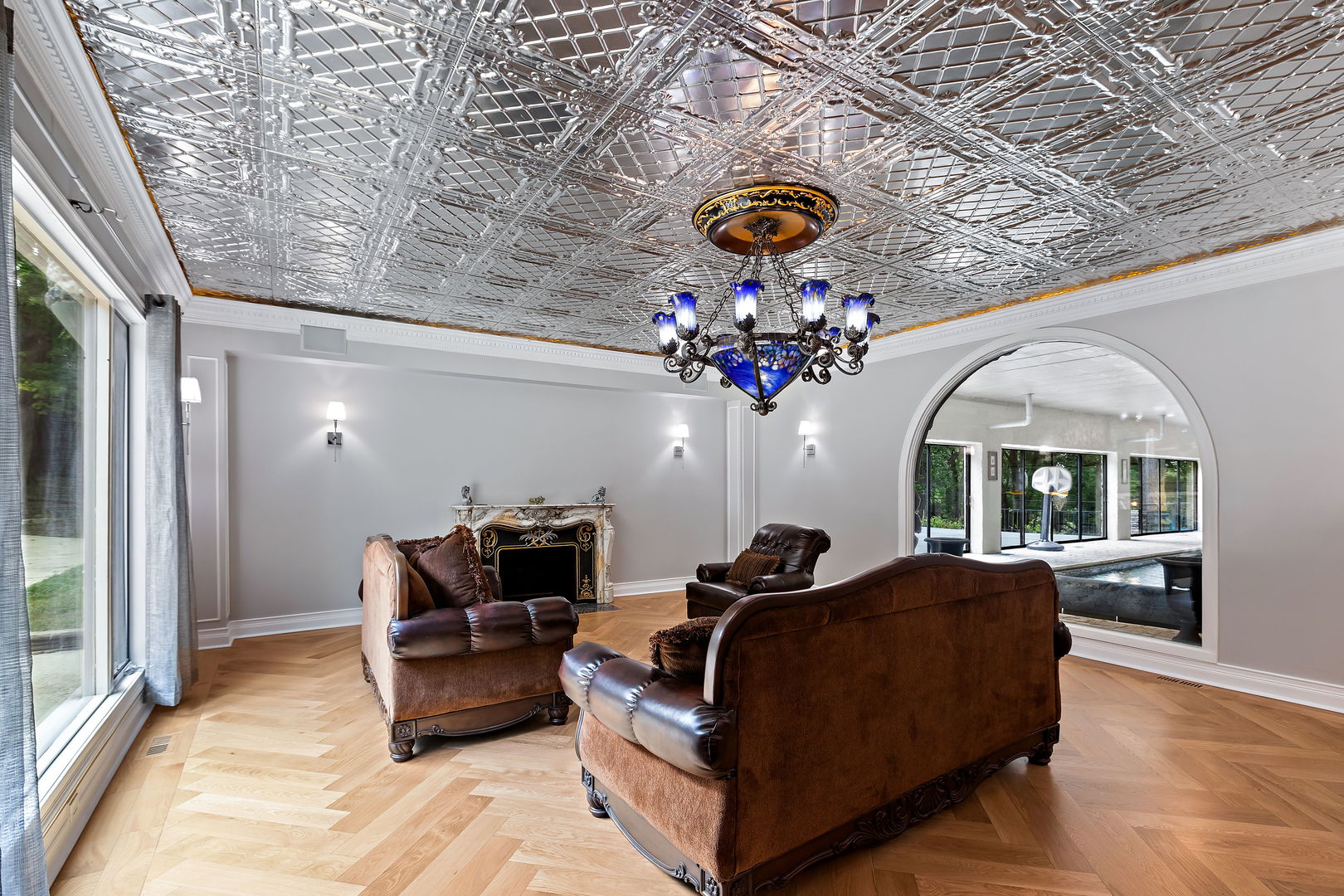 3 Saville Row Barrington Hills, IL 60010 - Photo 26 of 53 a living room with furniture and a chandelier