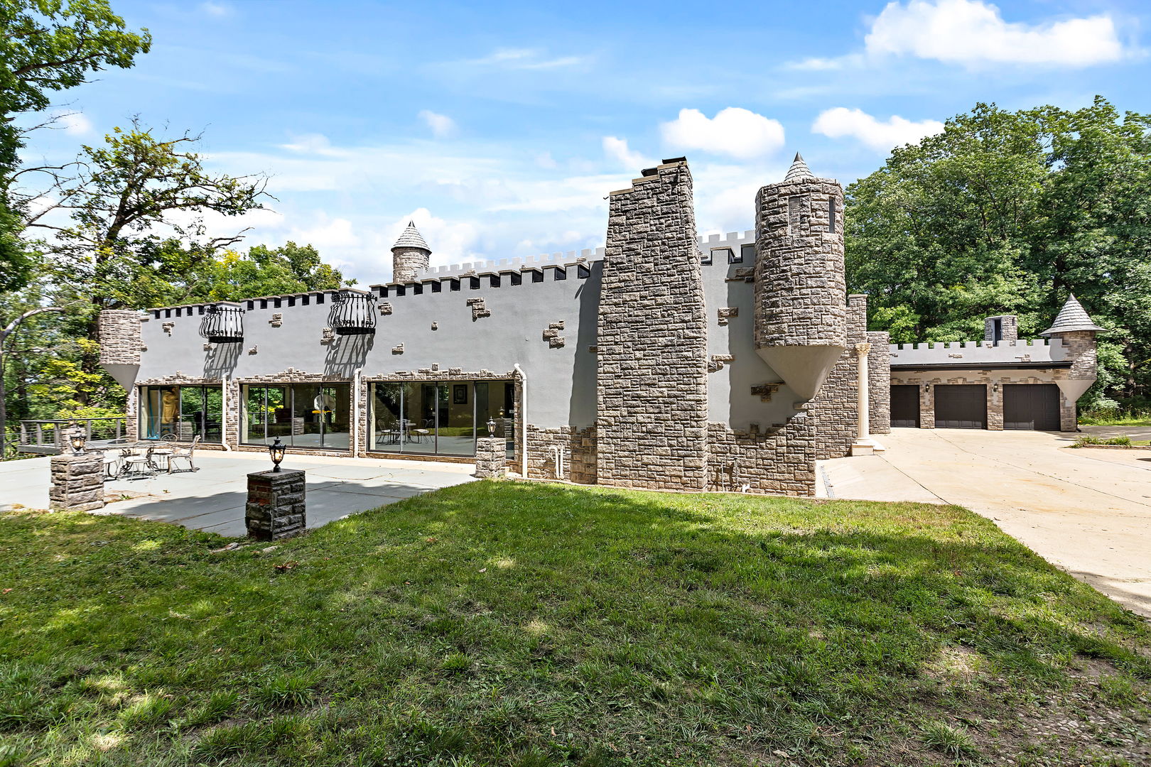 3 Saville Row Barrington Hills, IL 60010 - Photo 6 of 53 a view of a house with a backyard and a patio