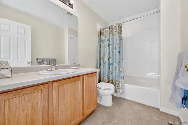 a view of livingroom with furniture and a window
