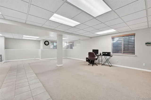 a front view of a house with a yard and porch