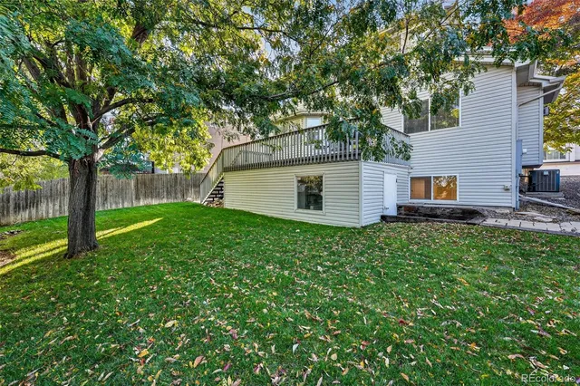 a view of a deck yard outdoor seating