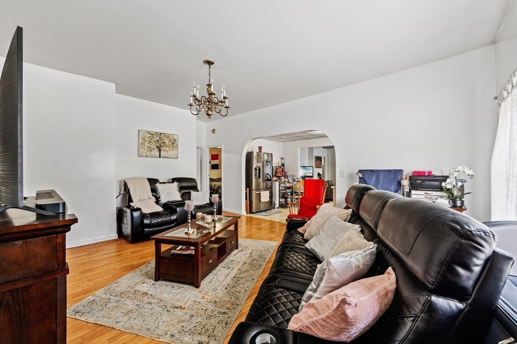 233 East Main Street Fall River, MA 02724 - Photo 15 of 29 a living room with furniture and a mirror