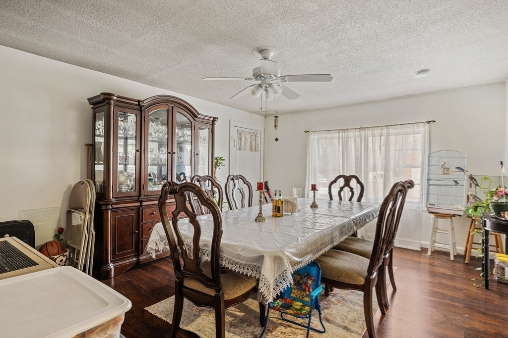 233 East Main Street Fall River, MA 02724 - Photo 16 of 29 a view of a a dining room with furniture window and wooden floor