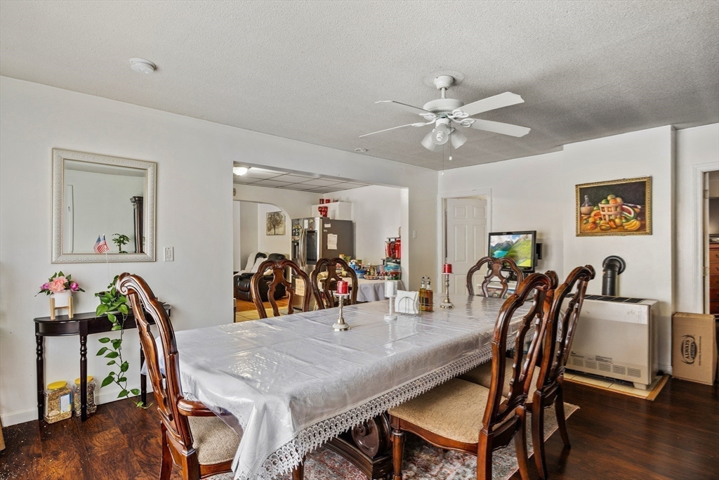 233 East Main Street Fall River, MA 02724 - Photo 17 of 29 a view of a dining room with furniture and wooden floor