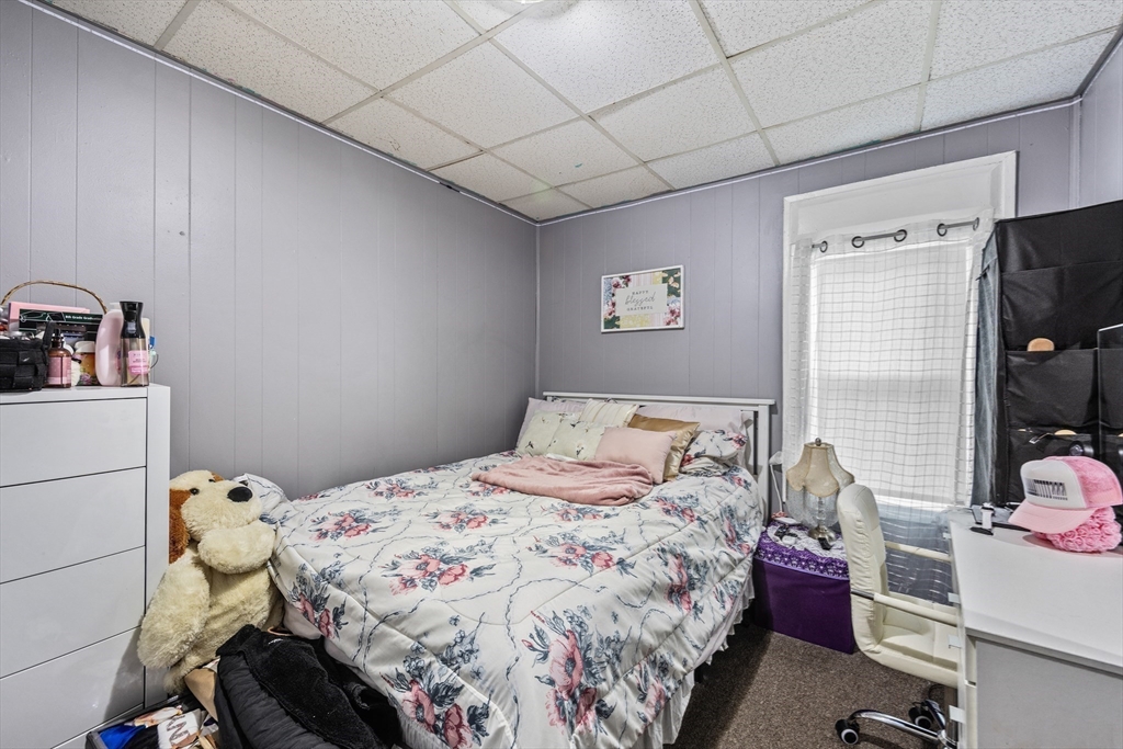 233 East Main Street Fall River, MA 02724 - Photo 20 of 29 a bedroom with a bed and a window