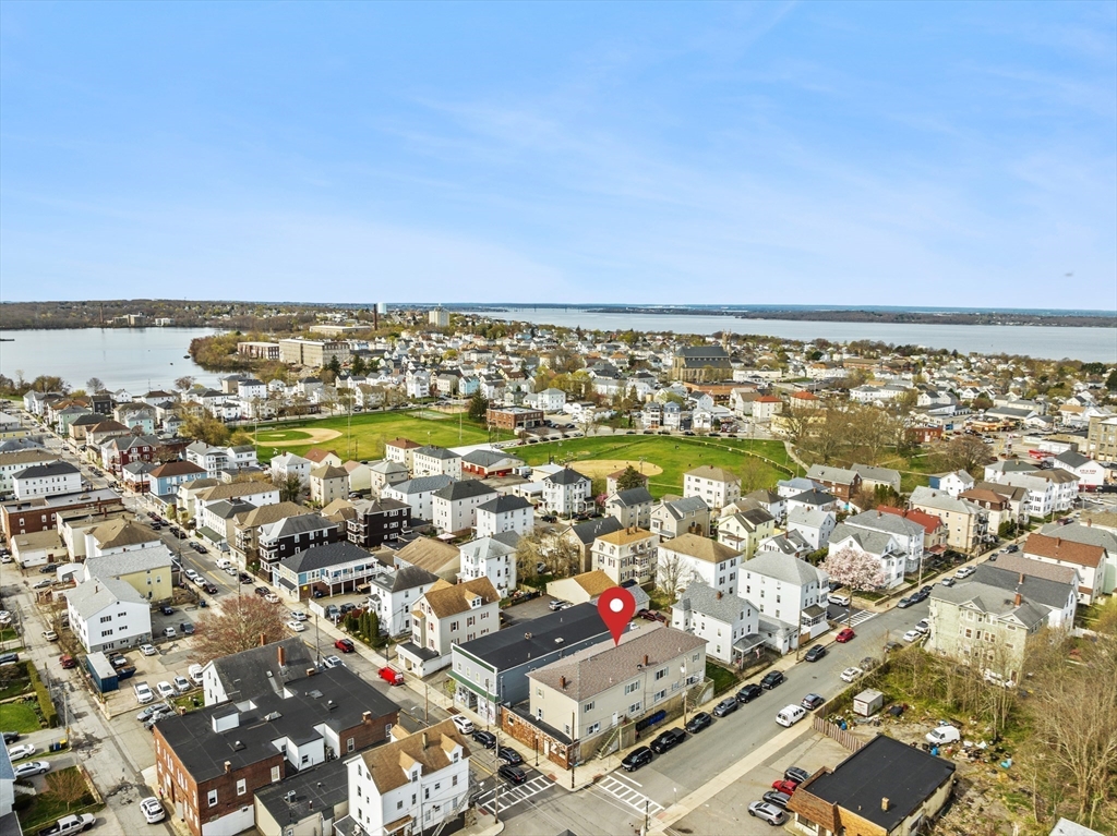 233 East Main Street Fall River, MA 02724 - Photo 25 of 29 an aerial view of residential building and parking space