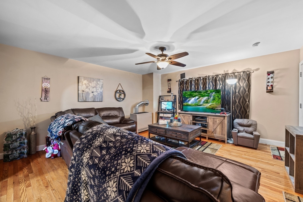 233 East Main Street Fall River, MA 02724 - Photo 8 of 29 a bedroom with furniture and a large window