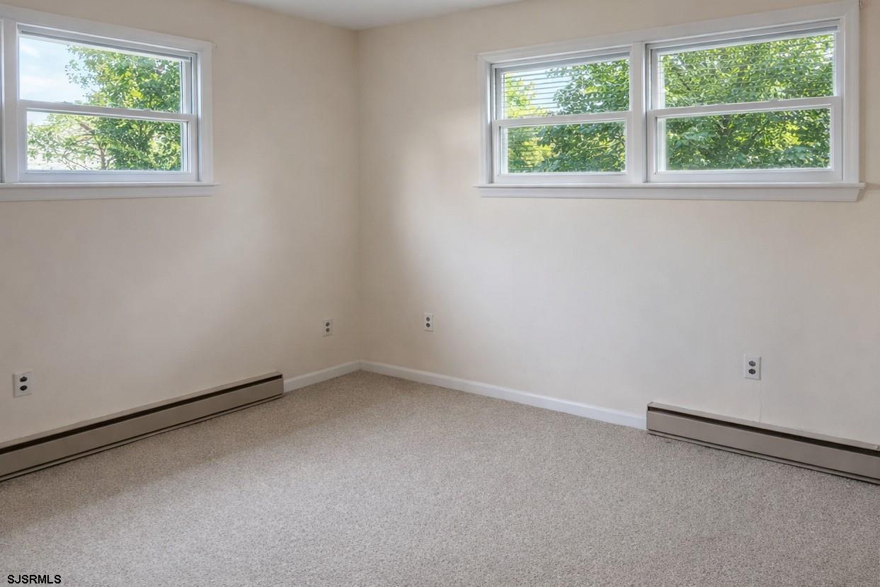 29 Summit Avenue Absecon, NJ 08201 - Photo 11 of 25 an empty room with a window