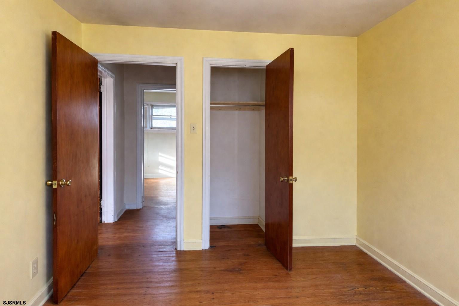 29 Summit Avenue Absecon, NJ 08201 - Photo 17 of 25 a view of a hallway with wooden floor