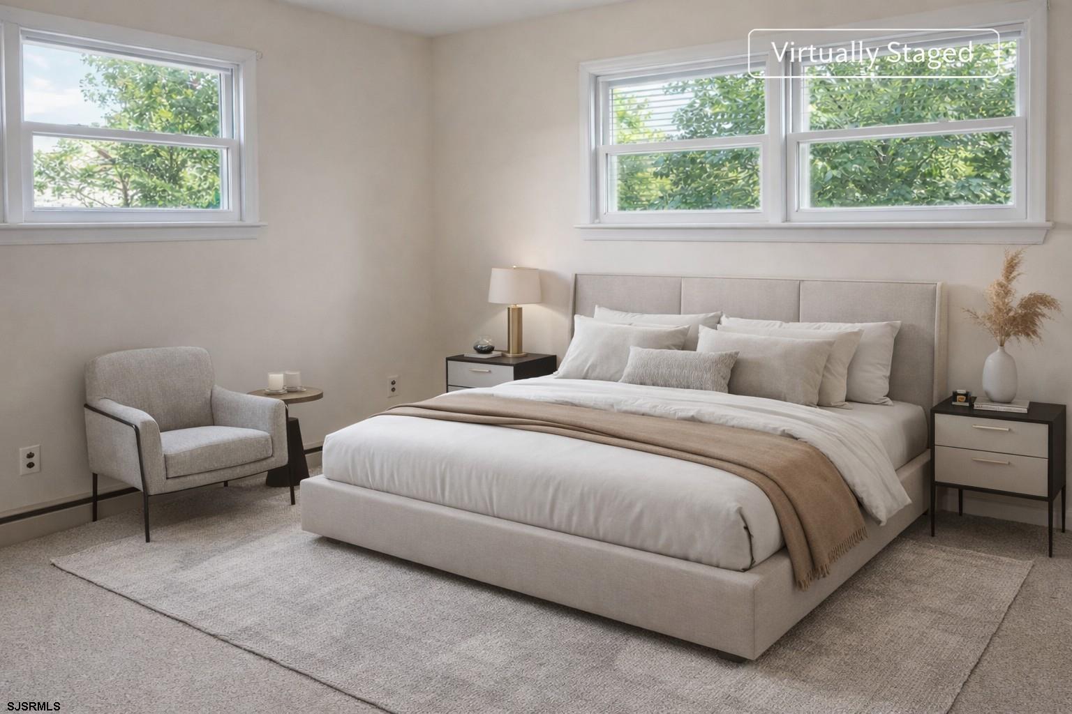 29 Summit Avenue Absecon, NJ 08201 - Photo 3 of 25 a bedroom with a bed and window