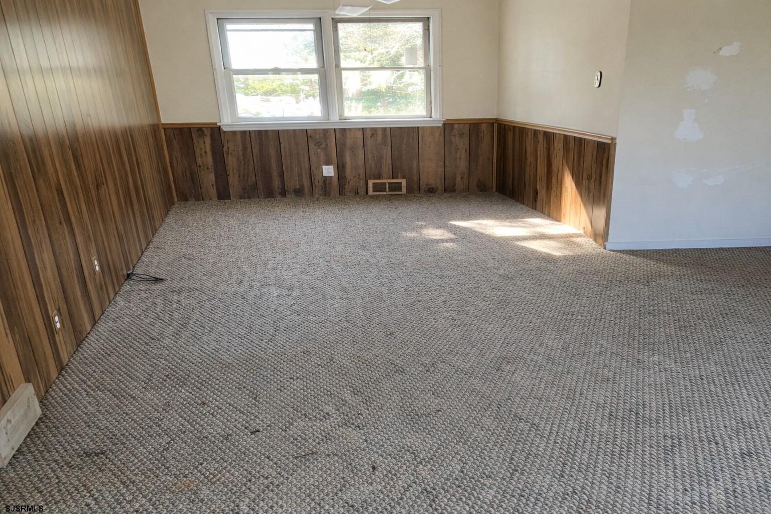 29 Summit Avenue Absecon, NJ 08201 - Photo 6 of 25 an empty room with windows