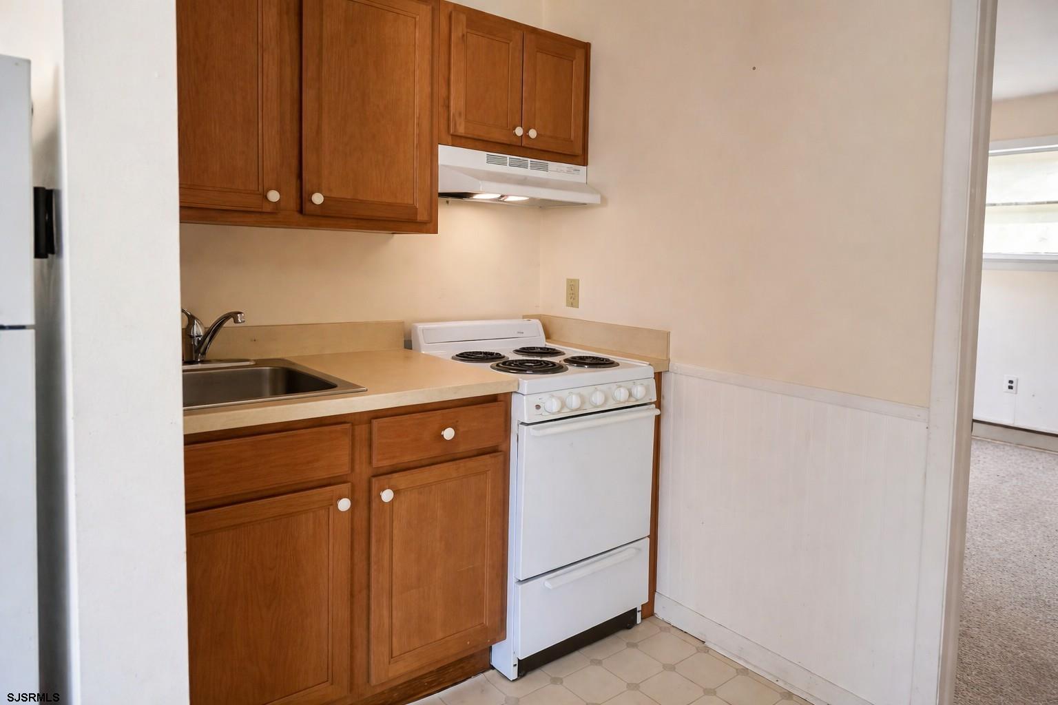 29 Summit Avenue Absecon, NJ 08201 - Photo 10 of 25 a kitchen with cabinets appliances