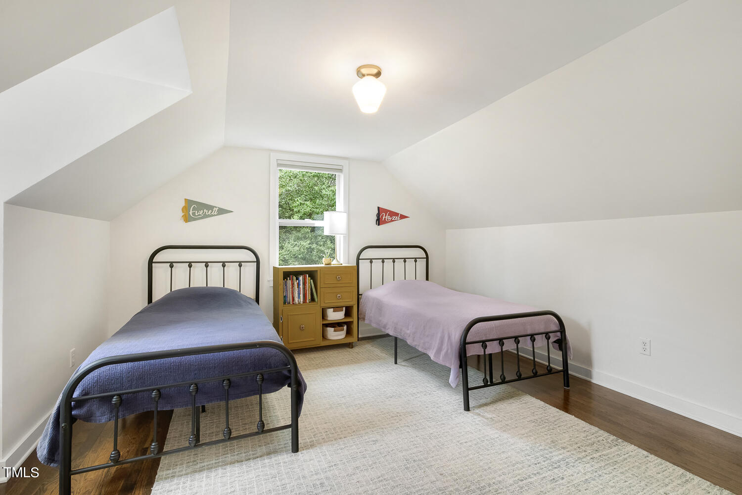 305 Colleton Road Raleigh, NC 27610 - Photo 12 of 17 a bedroom with furniture and a window
