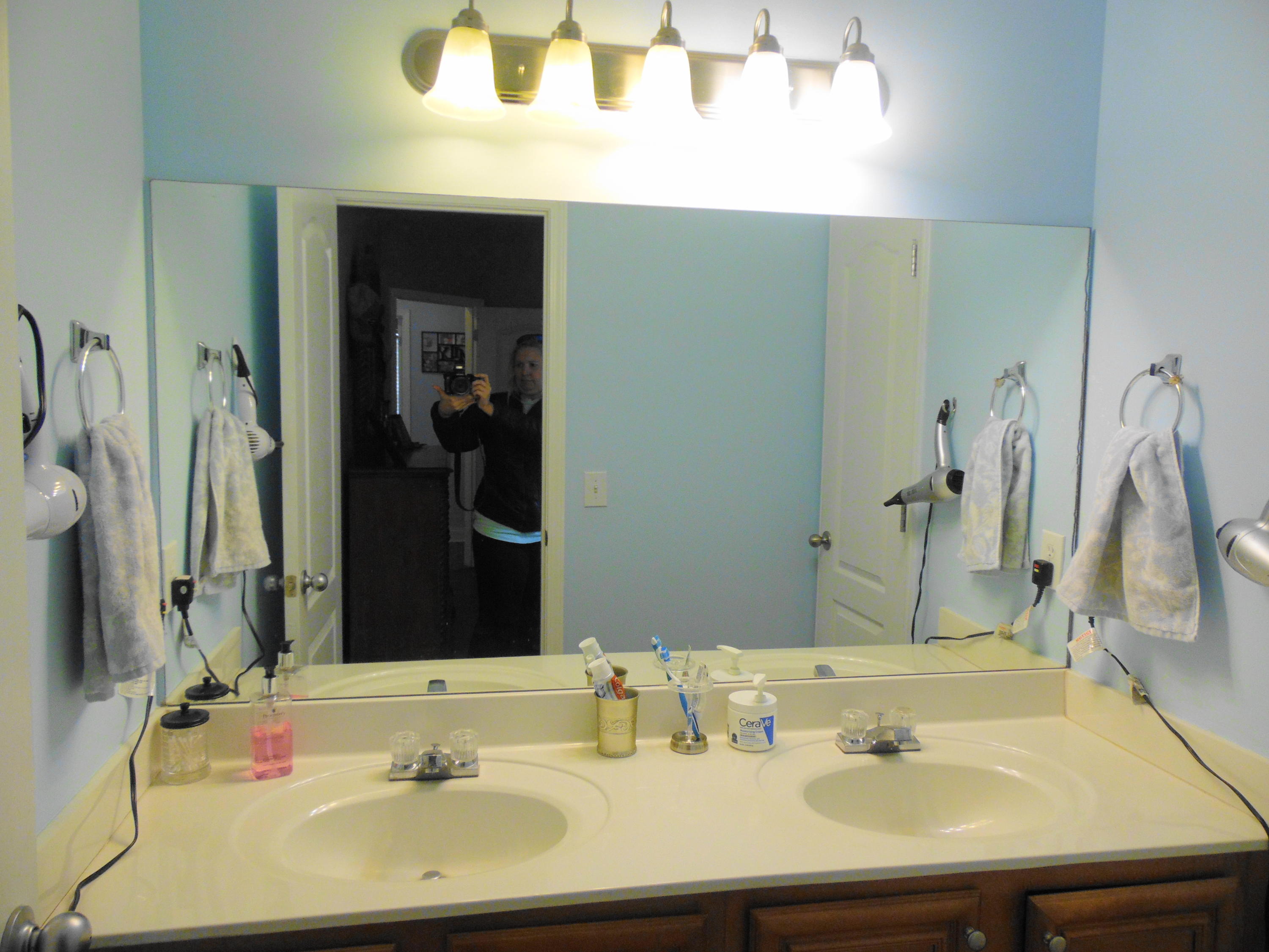 617 Tropical Way Freeport, FL 32439 - Photo 12 of 39 a bathroom with a sink and a mirror