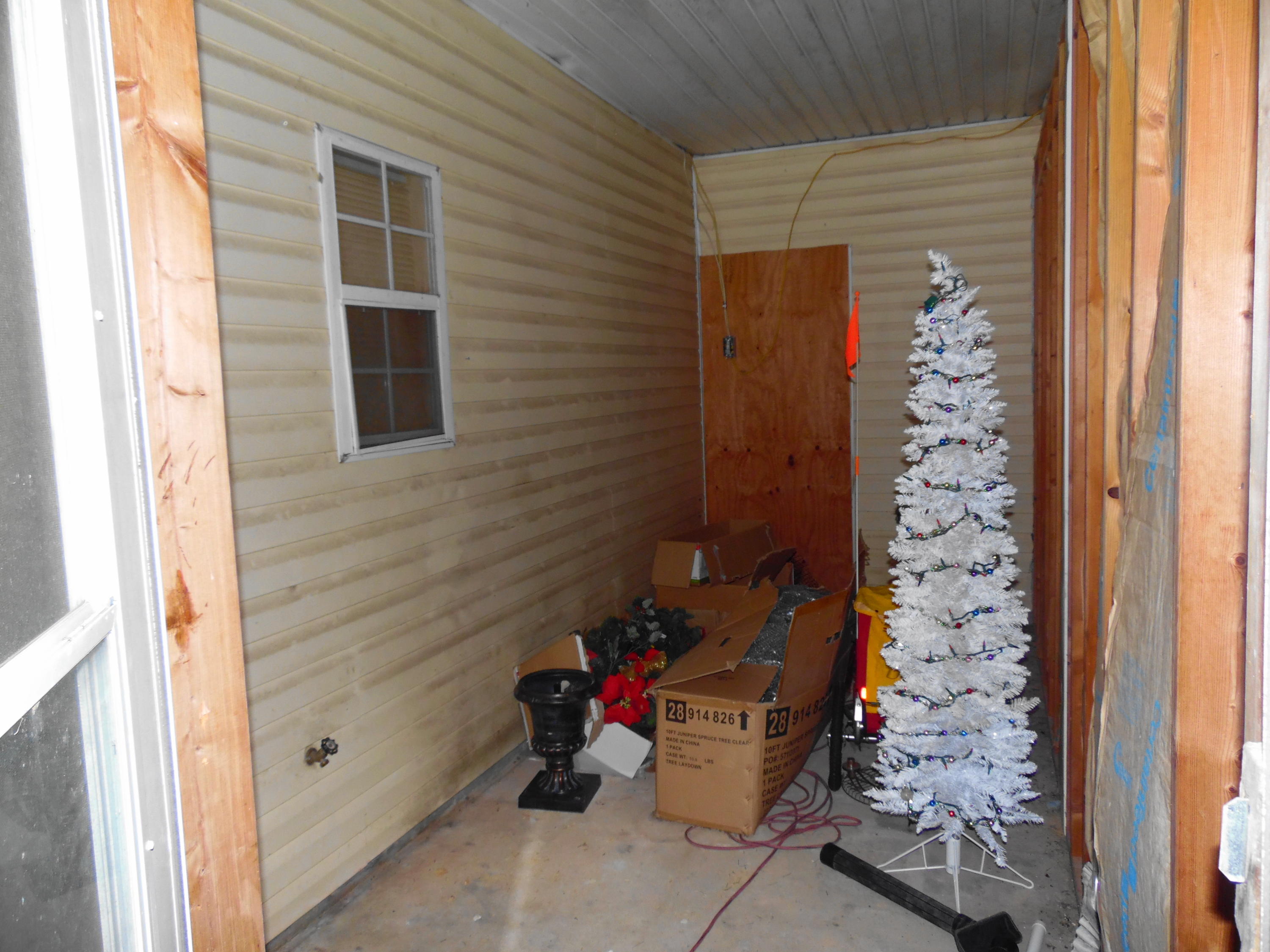 617 Tropical Way Freeport, FL 32439 - Photo 25 of 39 a view of a porch with outdoor space