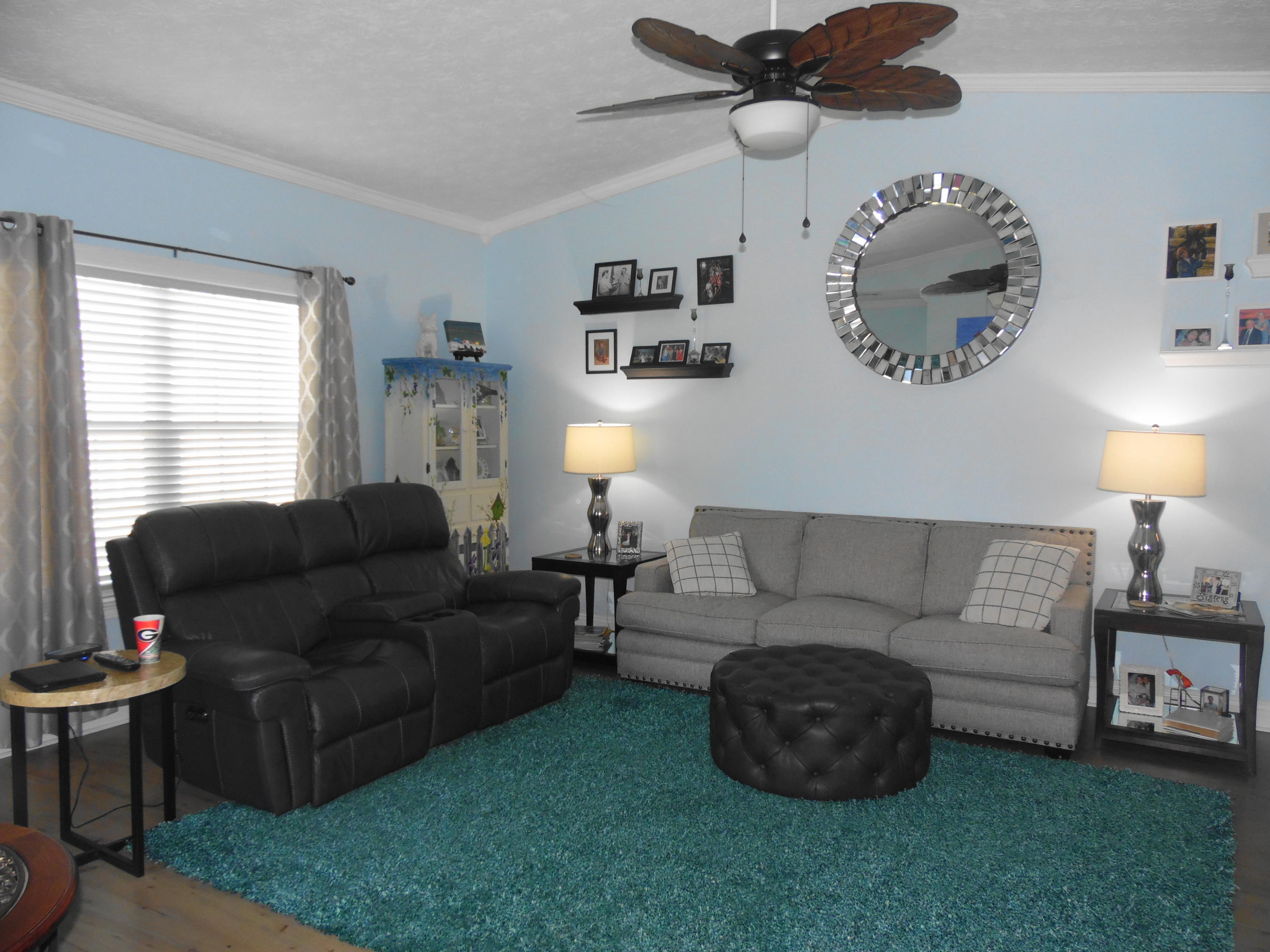 617 Tropical Way Freeport, FL 32439 - Photo 6 of 39 a living room with furniture and a window