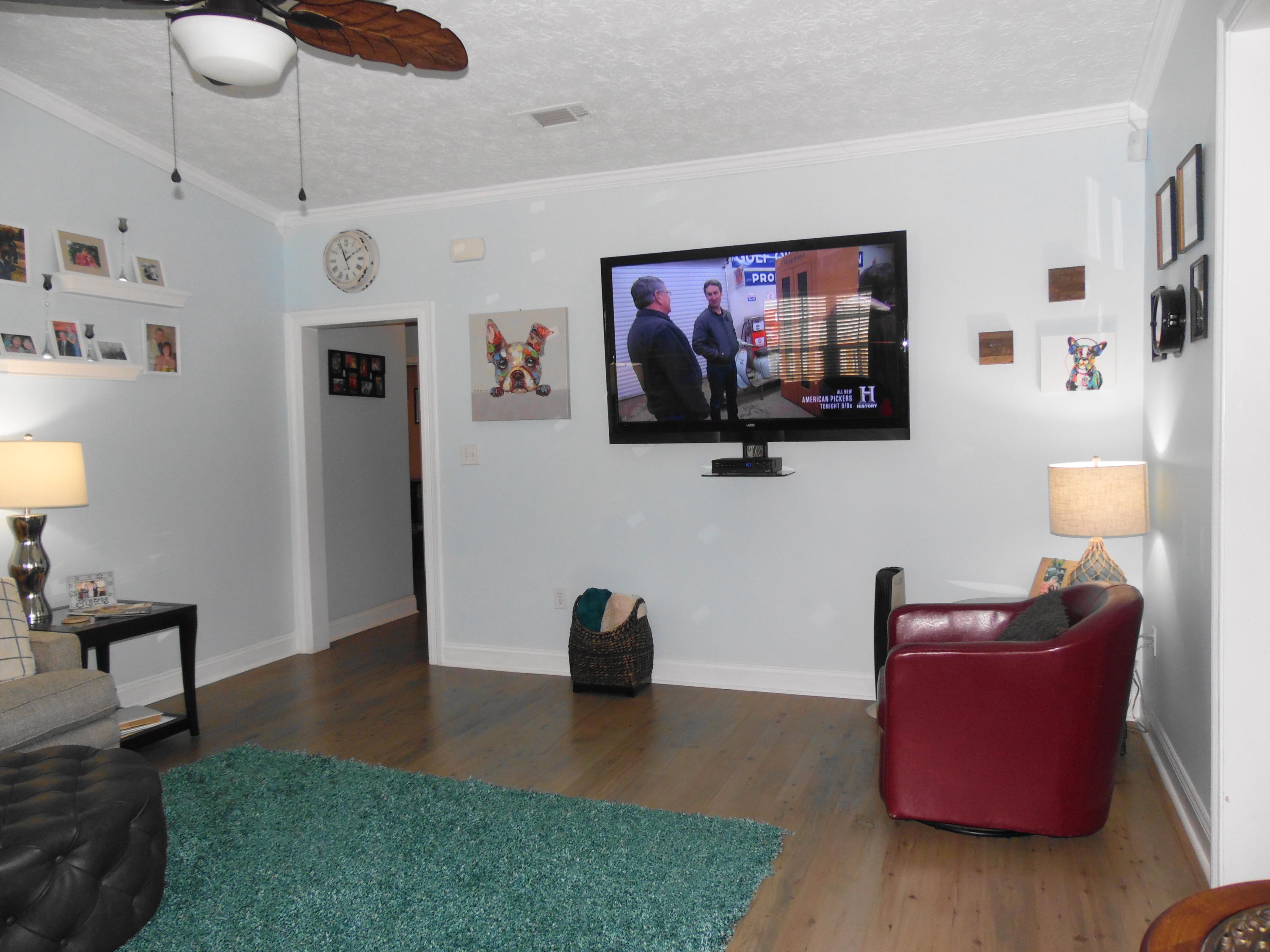 617 Tropical Way Freeport, FL 32439 - Photo 7 of 39 a living room with furniture and a flat screen tv
